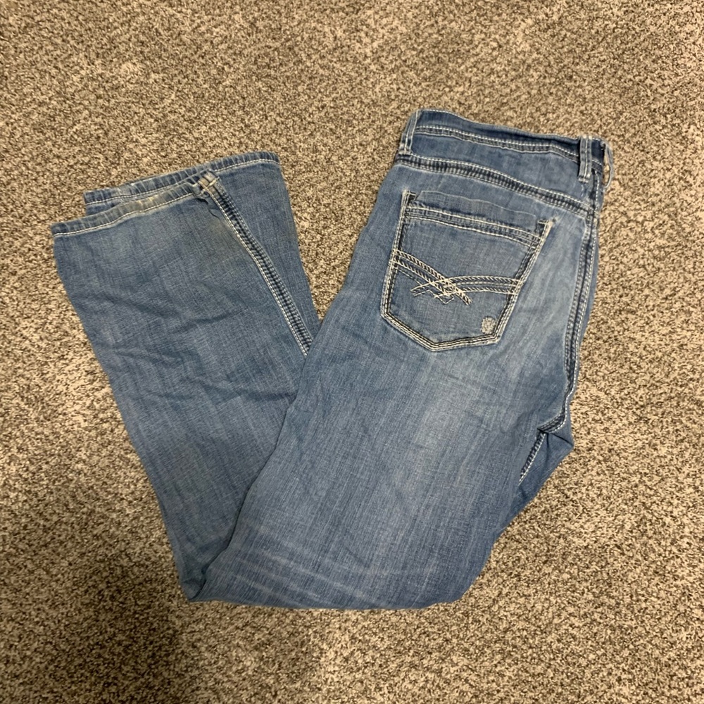 Men’s buckle jeans